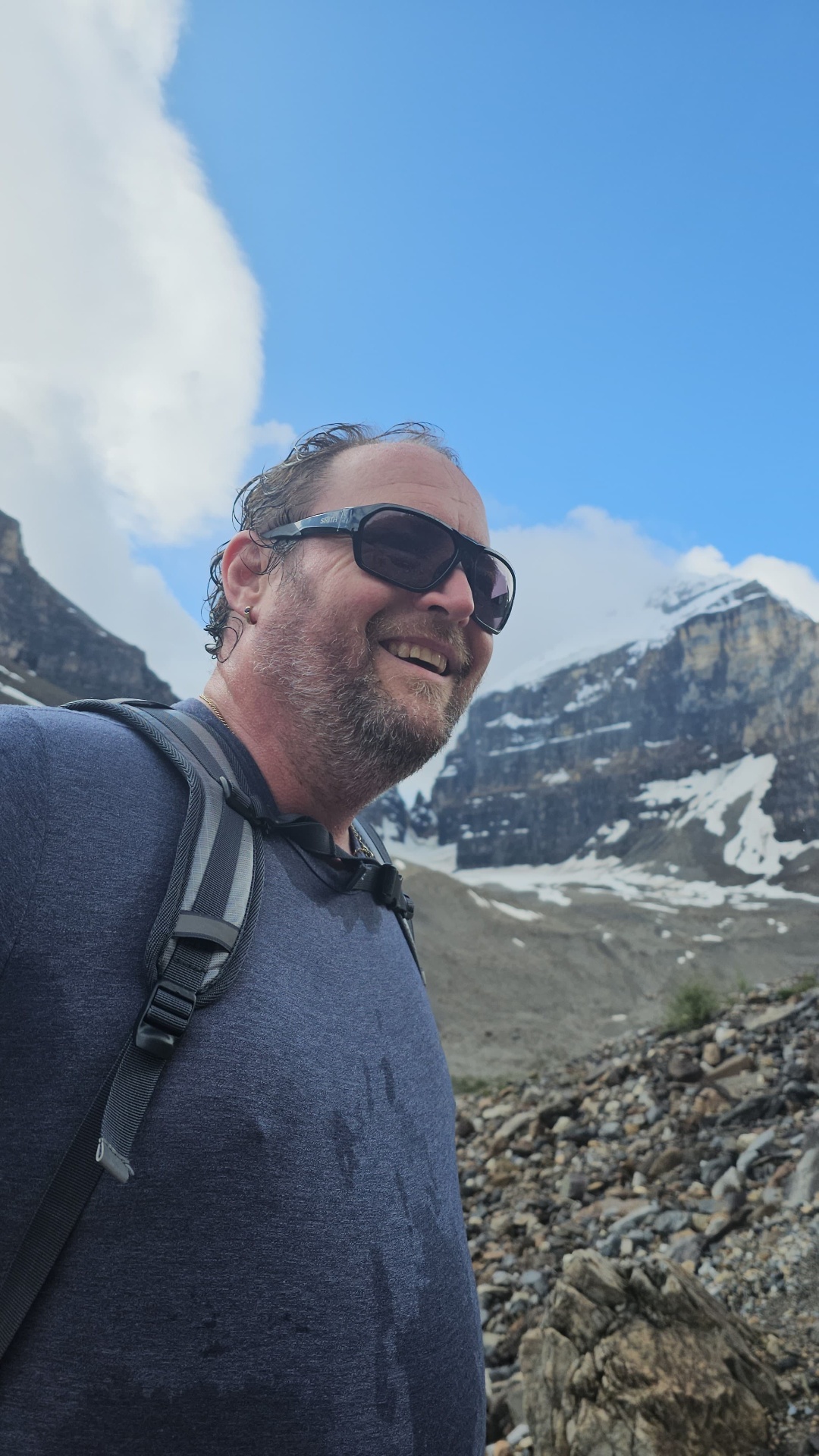 Rogan O'Donnell hiking in the mountains